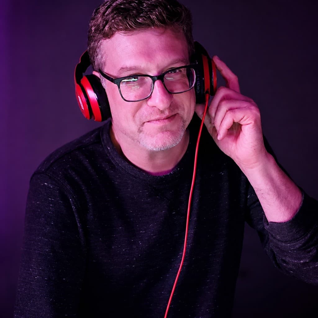 Scott Zumberg (DJ Zumby) in DJ mode with headphones