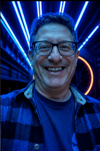 Scott Zumby at a neon-lit venue